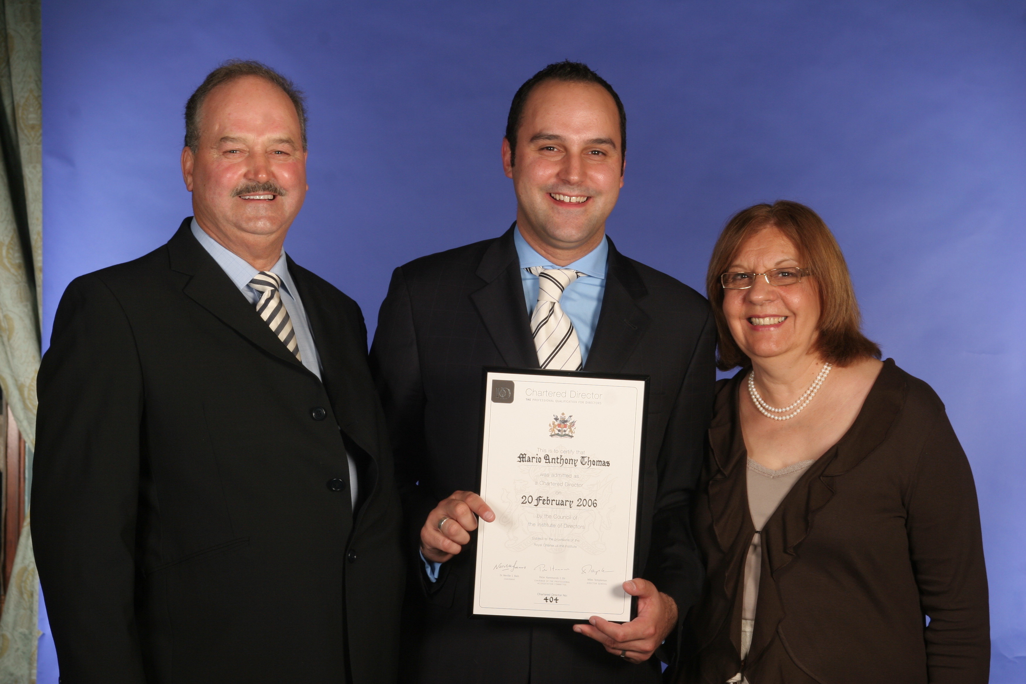 Helen, Anthony, and Mario Thomas at the IoD Chartered Director presentation evening. Helen, Anthony, and Mario Thomas at the IoD Chartered Director presentation evening.